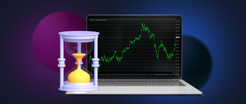 A laptop with forex data and an hourglass, symbolizing the value of patience in trading.
