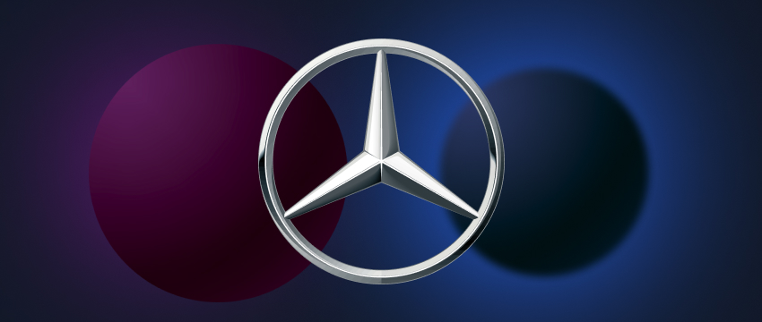Mercedes-Benz logo displayed prominently on a dark background, symbolizing luxury and automotive excellence.